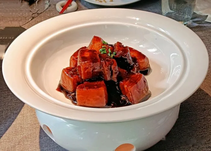 Glossy red-braised pork belly, one of Shanghai's benchmark benbang dishes